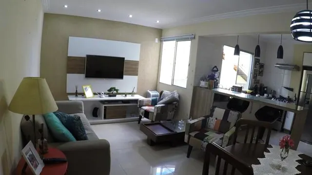 Foto 1 de Apartamento de 2 quartos (1 suíte) com cozinha americana em prédio com elevador, Varginha