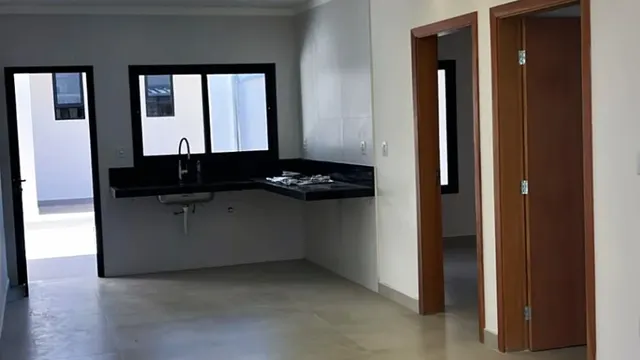 Casa com 6 suítes e sala integrada à cozinha, BPS