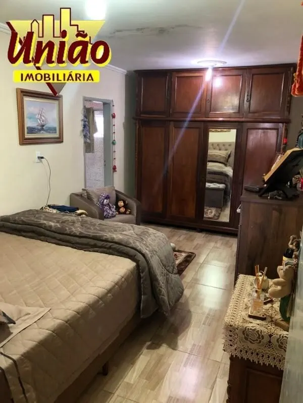 Foto 6 de Casa de 2 quartos (1 suíte) com 2 salas e quintal, Santa Rosa
