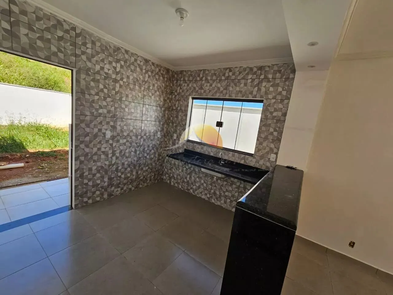 Foto 5 de Casa térrea de 2 quartos (1 suíte) com quintal e garagem, Jardim Califórnia
