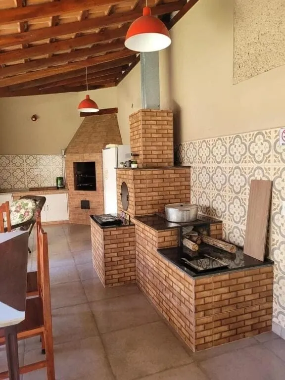 Foto 6 de Casa de 3 suítes com área gourmet e piscina, Centro