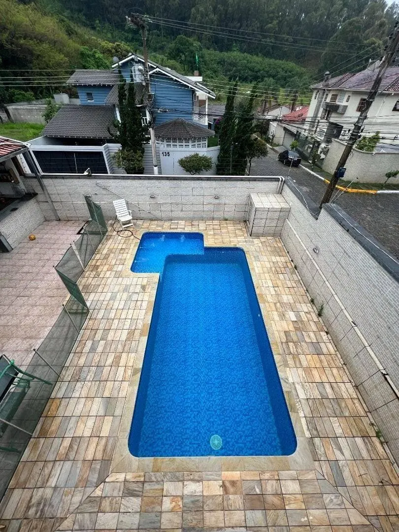 Foto 2 de Casa de 3 suítes com piscina, lareira, escritório e 6 vagas, Pinheirinho