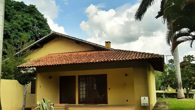 Foto 1 de Casa de 4 suítes com churrasqueira em condomínio fechado, Santa Rosa