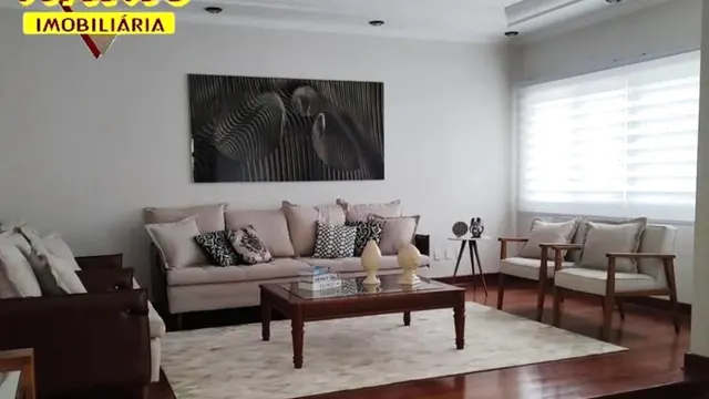 Foto 1 de Casa de alto padrão com 5 quartos (2 suítes) e área gourmet, Centro