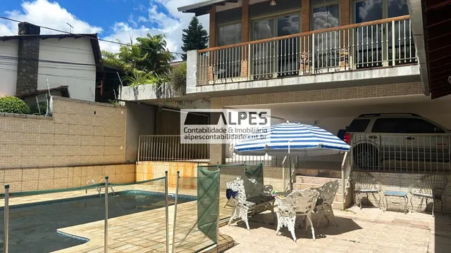 Foto 1 de Casa de 5 quartos (3 suítes) com piscina aquecida e área gourmet, Pinheirinho