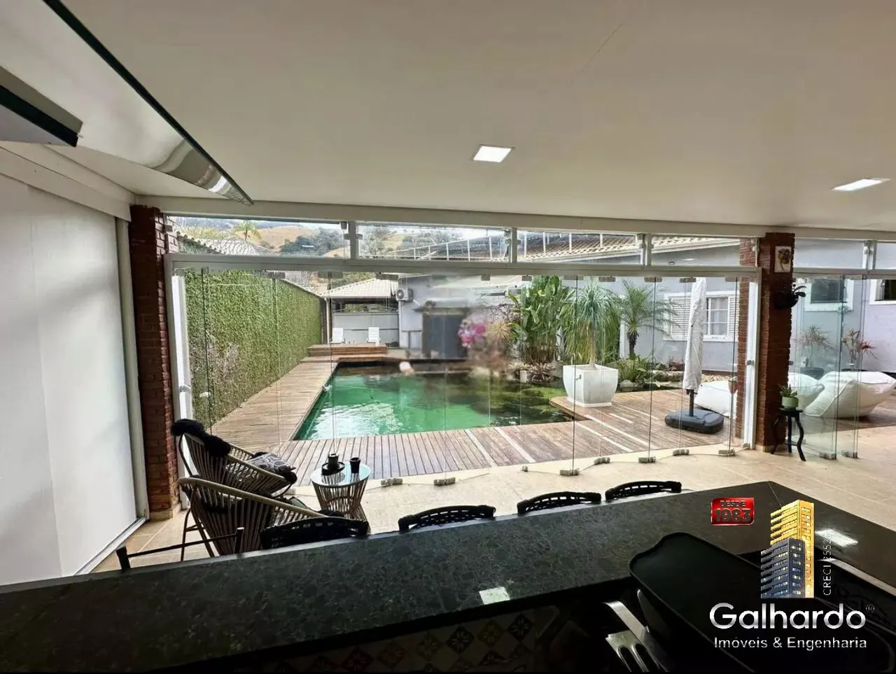 Foto 3 de Casa de 7 quartos (2 suítes) com piscinas e sauna em condomínio, Santa Rosa