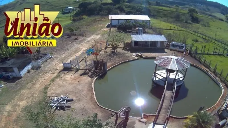 Foto 6 de Chácara com casa de 4 quartos, piscinas e tanque de peixes, Freires