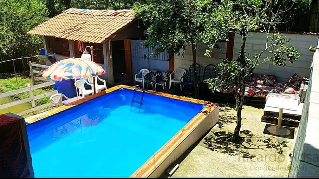 Chácara de 2.000 m² com casa de 4 quartos, lago e piscina, Moquém