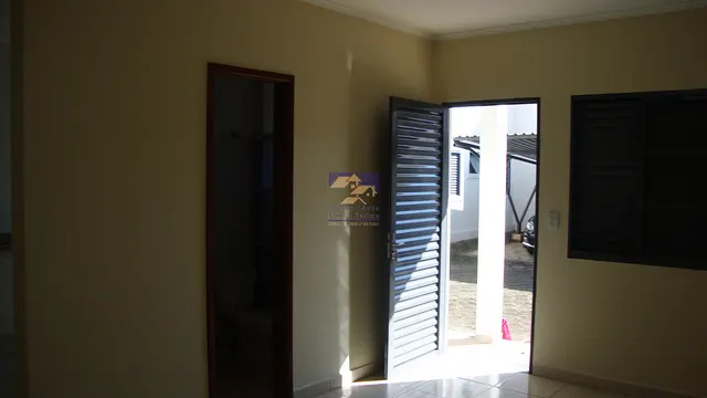 Kitnet com quarto e sala integrados, cozinha e área de serviço, Nossa Senhora da Agonia