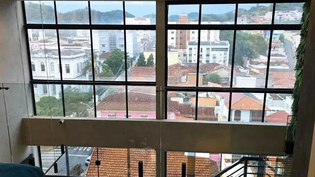 Foto 1 de Loft de 1 quarto com closet e móveis planejados, Centro