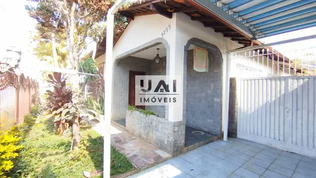 Foto 1 de Casa com edícula e terreno de 400 m² no Centro, Itajubá