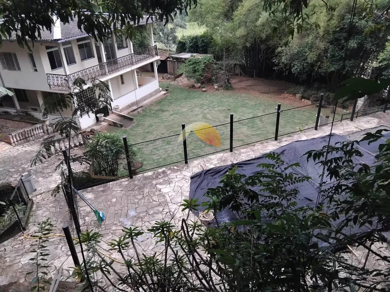 Foto 2 de Sítio de 1,5 alqueire com casa de 400 m², piscina e cachoeira, Área Rural de Itajubá