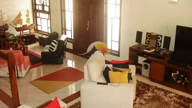 Foto 1 de Sobrado de 3 suítes com varanda, sauna e área de churrasco, Morro Chic