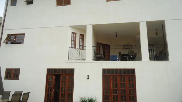 Foto 1 de Sobrado de 6 quartos (4 suítes) com piscina e área de churrasco, Jardim Eldorado